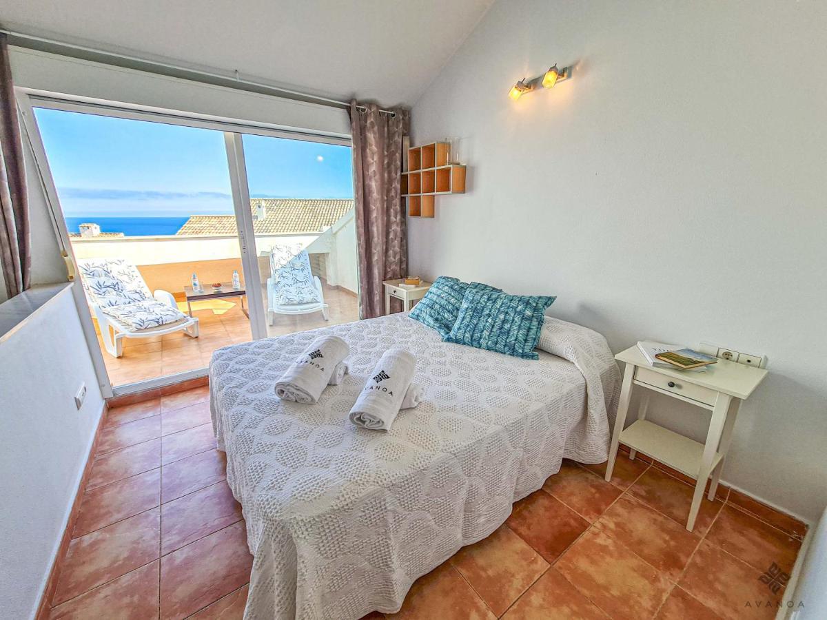 A005 - Ático dúplex en el centro de Altea con vistas parciales al mar Exterior foto
