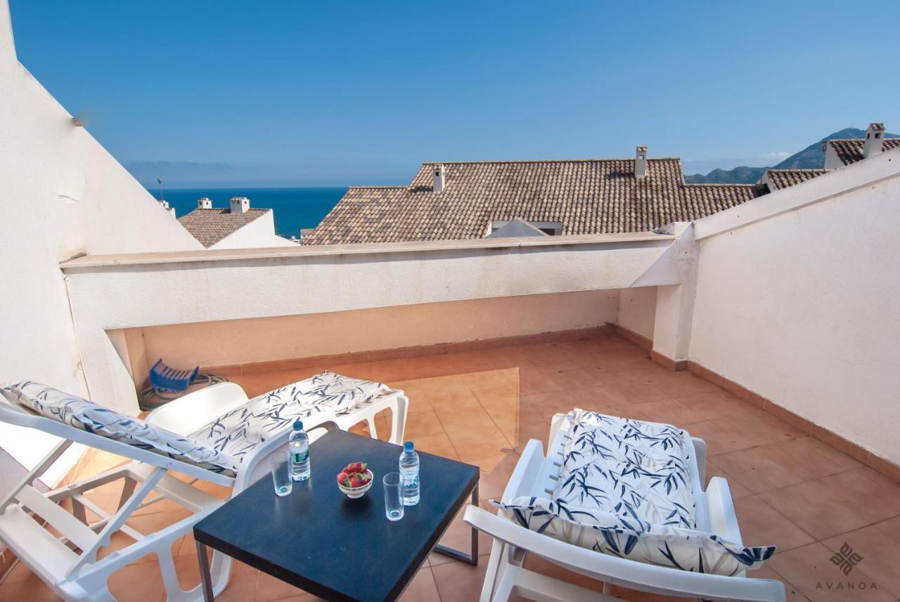 A005 - Ático dúplex en el centro de Altea con vistas parciales al mar Exterior foto